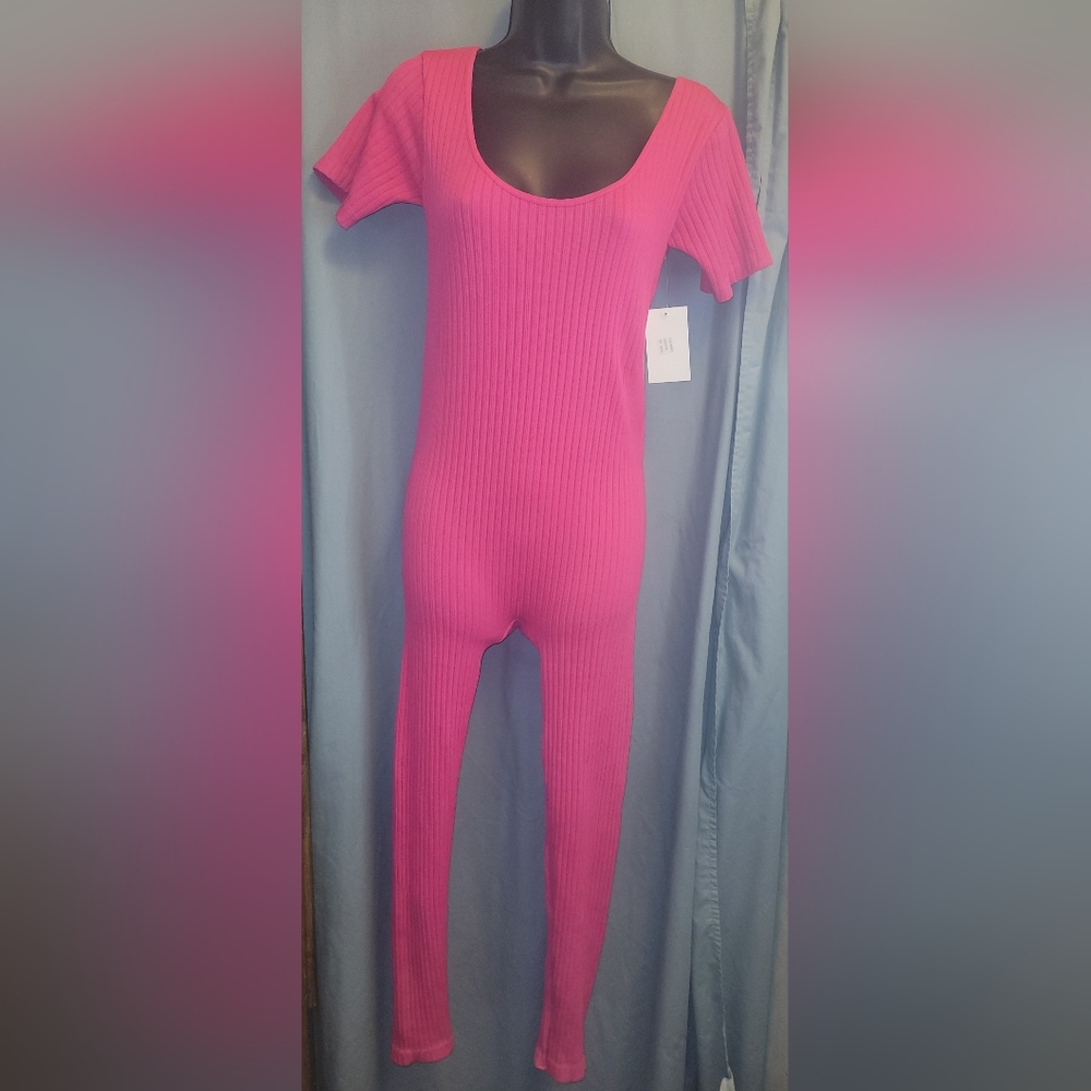 One size hot pink ribbed jumpsuit. NWT.